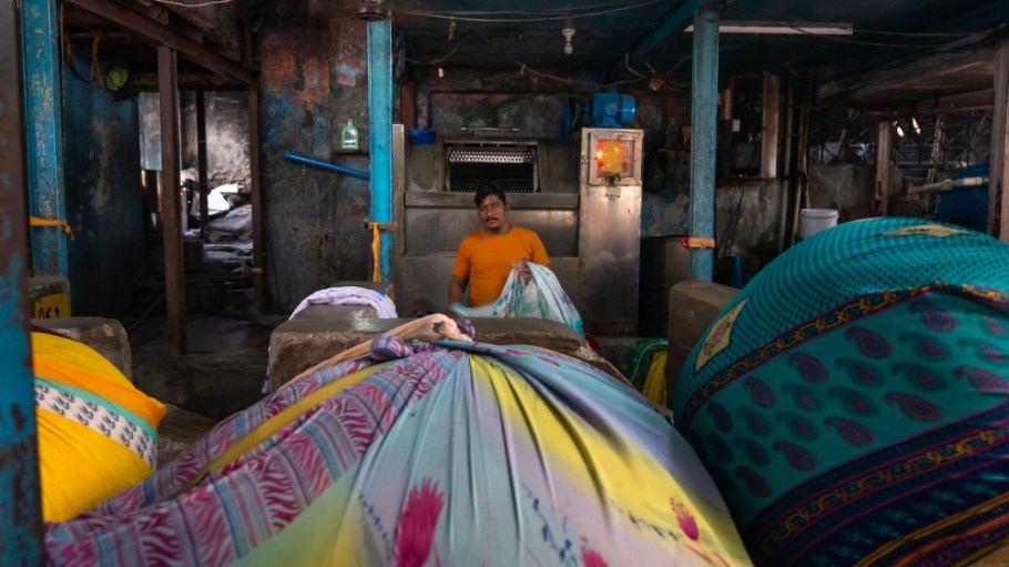 A laundry worker in Dhobi Ghat, Maharashtra state, Mumbai, India.
