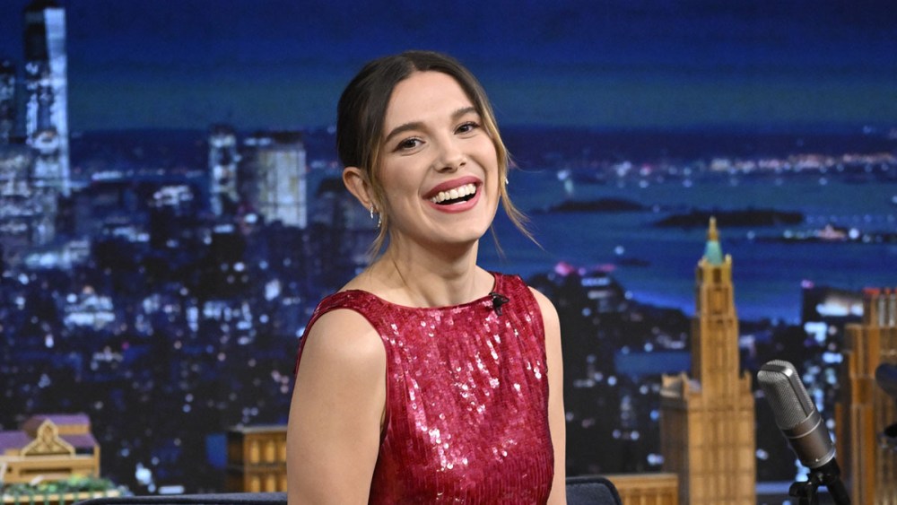Millie Bobby Brown red cult gaia sequins dress, engagement ring, on 'The Tonight Show Starring Jimmy Fallon.'