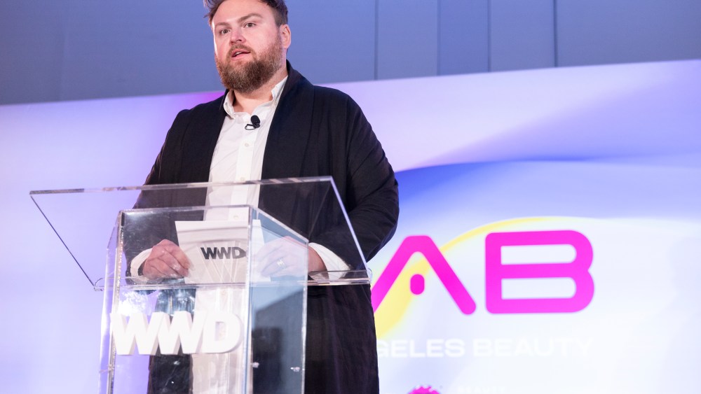 Sage & Salt founder Corbin Chamberlain on stage at the WWD LAB forum.