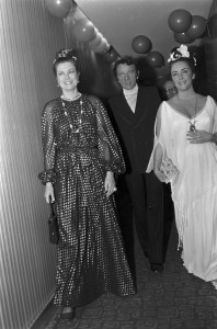 (L-R) Grace Kelly, Elizabeth Taylor, and Richard Burton attend a party during Taylor's weekend-long 40th birthday celebration in Budapest, Hungary, on Feb. 26-27, 1972.