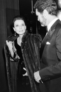 Audrey Hepburn and Robert Wolders attend an event at the Latin Paradis in Paris, France, on November 27, 1985.