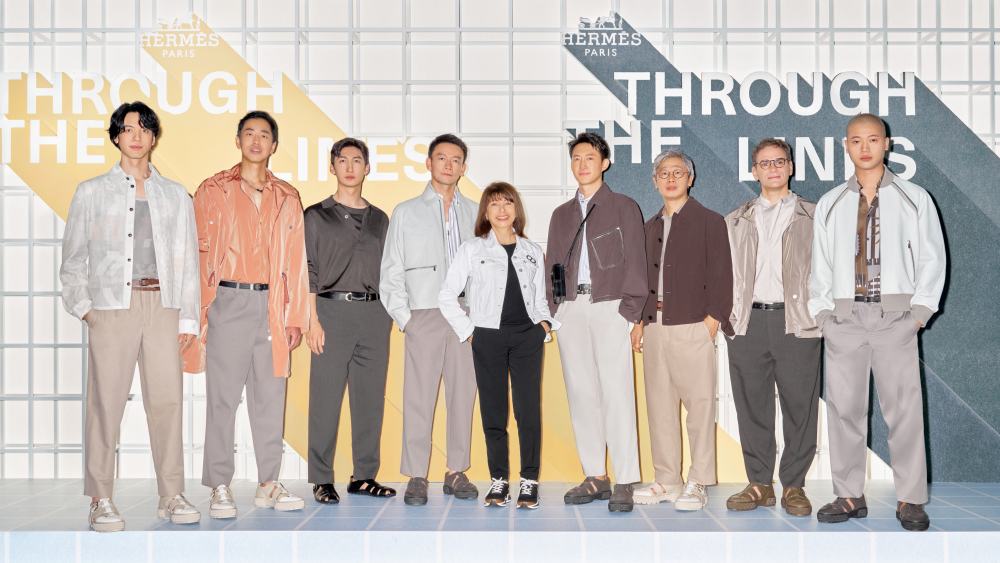 Véronique Nichania, center, with a cast of diverse local talents, including actor Liu Jia, reality star Wang Yuheng, athlete Wu Dajing, film director Guo Fan, actor Wang Yang, architect Liu Yichun, curator Philip Tinari, and star chef Jason Liu.