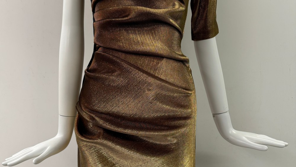 From Linda Fargo's closet, a gold one-shoulder exterior zip dress from Alber Elbaz for Lanvin.