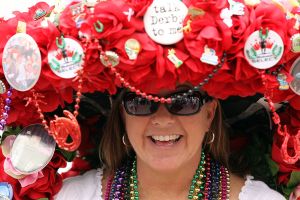 LOUISVILLE, KY - MAY 07:  A fan looks on wearing her derby hat in the paddock area during the 137th Kentucky Derby at Churchill Downs on May 7, 2011 in Louisville, Kentucky.  (Photo by Al Bello/Getty Images)