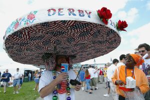 LOUISVILLE, KY - MAY 3:  Tony Offutt of New Albany, IN walks through the infield with a hat he made for a hat contest prior to  the 129th Kentucky Derby on May 3, 2003 at Churchill Downs in Louisville, Kentucky.  (Photo by Jamie Squire/Getty Images)