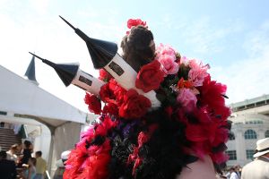 LOUISVILLE, KY - MAY 02:  A man wearing a festive hat looks on prior to the 141st running of the Kentucky Derby at Churchill Downs on May 2, 2015 in Louisville, Kentucky.  (Photo by Andy Lyons/Getty Images)