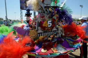 LOUISVILLE, KY - MAY 03:  A race fan wearing a festive hat looks on from the infield prior to the 140th running of the Kentucky Derby at Churchill Downs on May 3, 2014 in Louisville, Kentucky.  (Photo by Dylan Buell/Getty Images)