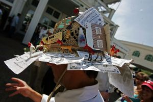LOUISVILLE, KY - MAY 06: A race fans wears his derby hat in the paddock during the 132nd Kentucky Derby on May 6, 2006 at Churchill Downs in Louisville, Kentucky.  (Photo by Andy Lyons/Getty Images)