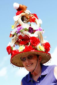 LOUISVILLE, KY - MAY 03:  A race fan stands in the Paddock area durinng the 134th running of the Kentucky Derby on May 3, 2008 at Churchill Downs in Louisville, Kentucky.  (Photo by Jamie Squire/Getty Images)