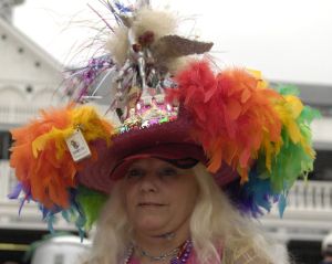 A race fan named Ginny from Louisville claims a $4000 hat  on Kentucky Derby day May 5, 2007  at Churchill Downs  in Louisville. (Photo by A. Messerschmidt/Getty Images) *** Local Caption ***