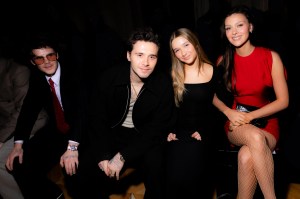 Brooklyn Beckham, Harper Beckham, and Nicola Peltz Beckham at Victoria Beckham RTW Fall 2024.