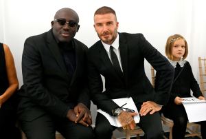 Edward Enninful, David Beckham, and Harper Beckham in the front row at the Victoria Beckham Spring RTW 2019 show.