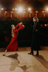 Gabriela Hearst and the lead dancer from the ballet Carmen wearing the costume she designed.