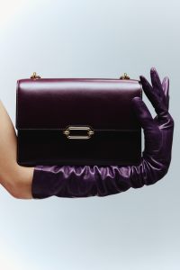 Hermès leather bag; Carolina Amato gloves.