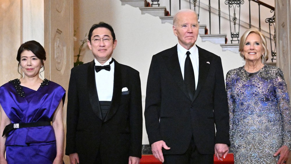 US President Joe Biden (2nd R), First Lady Jill Biden (R), Japanese Prime Minister Fumio Kishida (2nd L) and his wife Yuko Kishida pose during a photo opportunity on the occasion of the State Dinner on the Grand Staircase of the White House in Washington, DC, on April 10, 2024. (Photo by Mandel NGAN / AFP) (Photo by MANDEL NGAN/AFP via Getty Images)
