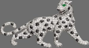 Cartier Panthere de Cartier High Jewelry brooch, 18-karat white gold, emeralds, onyx and diamonds.