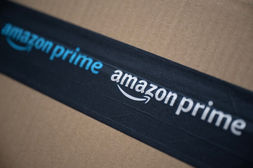 The logo of e-commerce company Amazon prime is pictured on a parcel, in Manta, Northwestern Italy, on March 29, 2024. (Photo by MARCO BERTORELLO / AFP) (Photo by MARCO BERTORELLO/AFP via Getty Images)