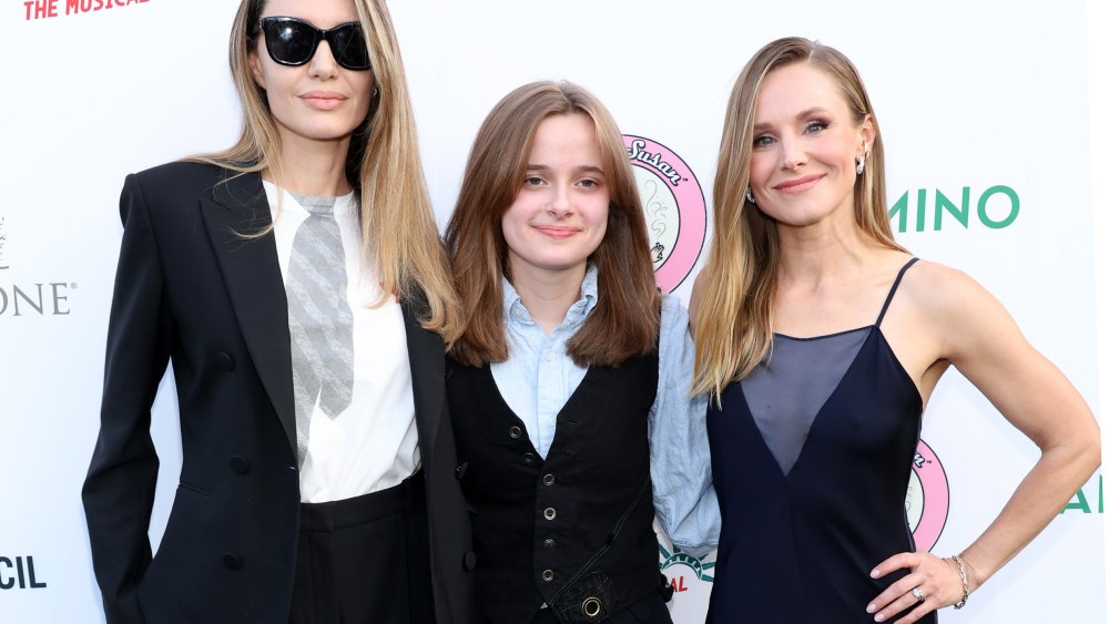 LOS ANGELES, CALIFORNIA - MAY 30: (L-R) Angelina Jolie, Vivienne Jolie-Pitt and Kristen Bell attend the opening night performance of "Reefer Madness: The Musical" at The Whitley on May 30, 2024 in Los Angeles, California. (Photo by Monica Schipper/Getty Images)