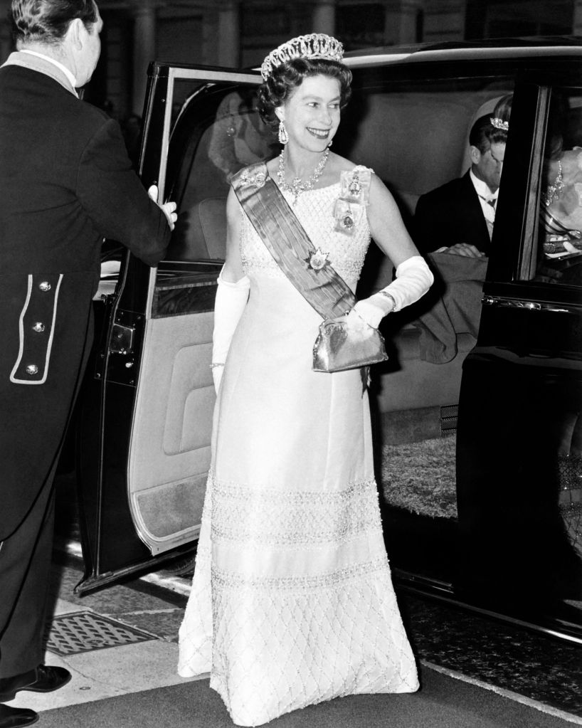 Britain's Queen Elizabeth II, wearing the Vladimir Tiara, arrives on June 15, 1972 at the Claridge in London. The tiara, Made for Grand Duchess Vladimir, aunt of the last Russian Tsar Nicholas II, was inherited by The Queen from her grandmother Queen Mary in 1953. (Photo by CENTRAL PRESS / AFP) (Photo by -/CENTRAL PRESS/AFP via Getty Images)