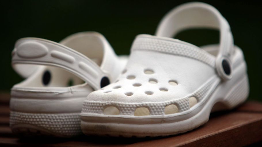 A pair of Croc style shoes.