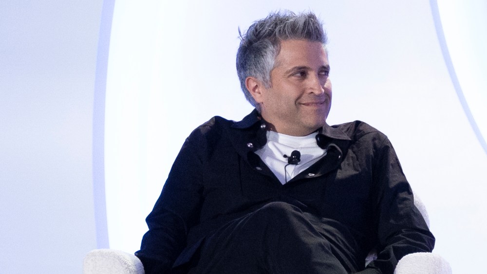L'Oréal's Guive Balooch on stage at the 2024 WWD Beauty CEO Summit.