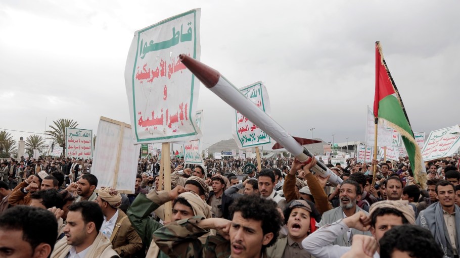 Yemenis lift Houthi emblems in an anti-Israel protest on April 26.