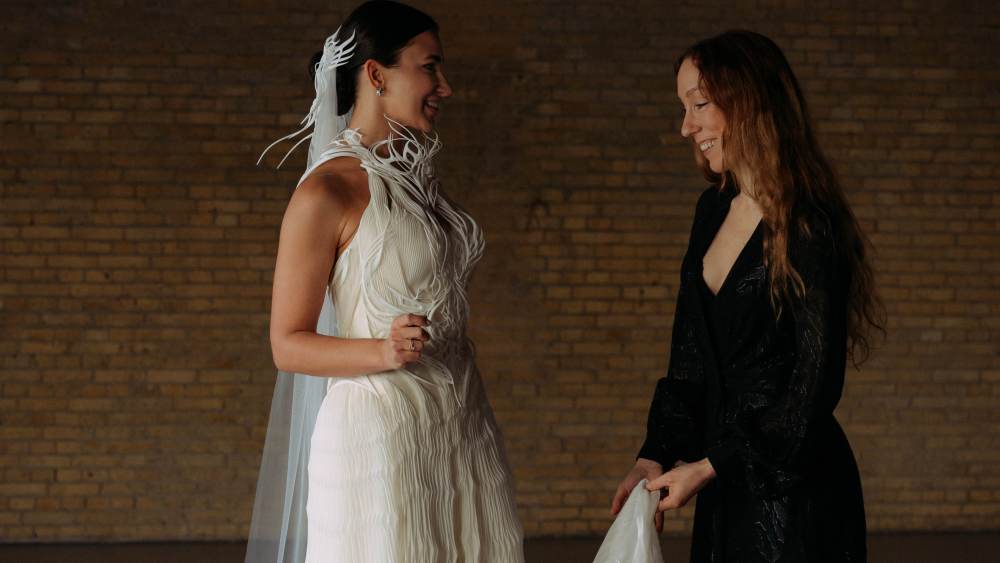 The unveiling of the world's first 3D-printed wedding dress by Iris Van Herpen.