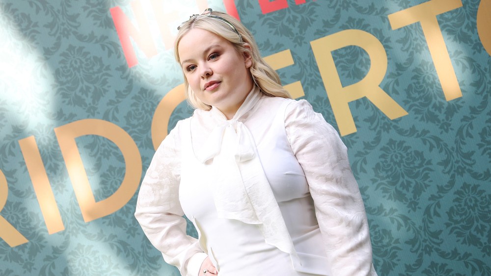 Nicola Coughlan attends a photo call for "Bridgerton" season three on May 9 in Milan, Versace, red carpet, Netflix