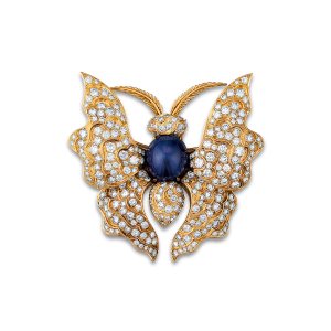Reza Butterfly Brooch in yellow gold, blue sapphire and diamond.