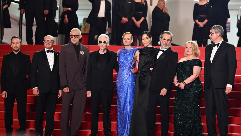 Anthony Vaccarello, Martin Katz, Diane Kruger, David Cronenberg, Diane Kruger, Sandrine Holt, Guy Pearce and Elizabeth Saunders at the premiere of "The Shrouds" at Cannes Film Festival on May 20, red carpet, Versace