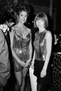 Editor Anna Wintour and model Janice Dickinson at the Ingrid Sischy Dinner Party for Gianni Versace at Barocco in 1994.