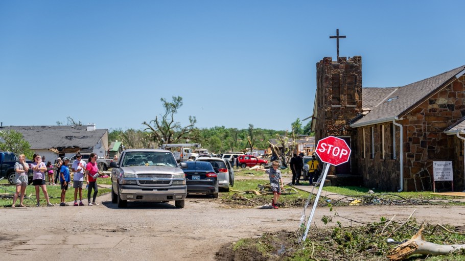 Residents navigate their neighborhood following a tornado on May 7, 2024 in Barnsdall, Okla.