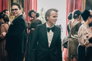 Daniel Brühl as Karl Lagergeld, Alex Lutz as Pierre Bergé