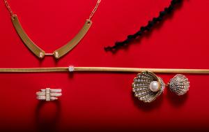 Nouvel Heritage Dinner Date necklace in 18-karat yellow gold and diamonds; Marco Bicego 18-karat yellow gold, diamond necklace (laid flat); John Hardy Spear Ring in 18-karat yellow gold with baguette and pavé white diamonds; Swarovski gold-tone plated, crystals and crystal pearl earring.