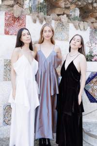 Danielle Haim, Este Haim and Alana Haim front row at the Louis Vuitton Cruise 2025 show.