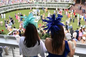 Guests attend the Kentucky Derby 150 at Churchill Downs.