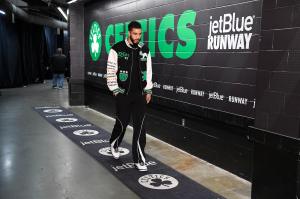 Jayson Tatum of the Boston Celtics arrives at the arena before the game against the Utah Jazz on January 5, 2024 at the TD Garden in Boston, Massachusetts.