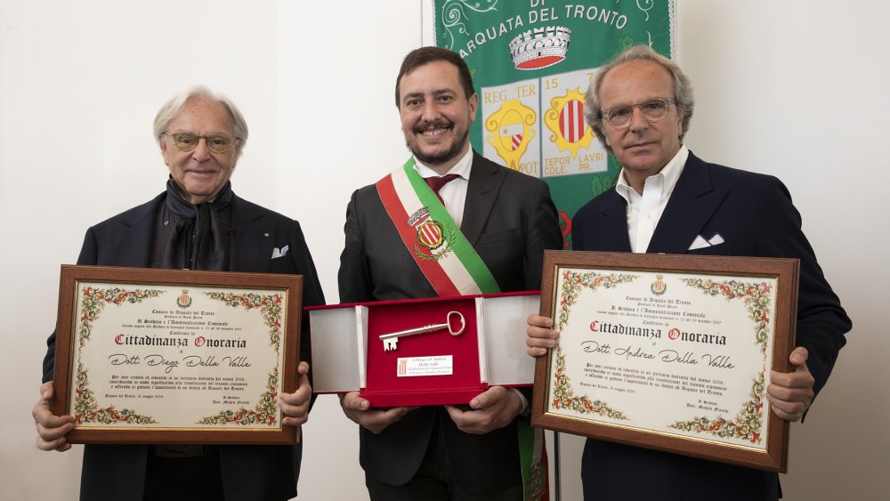Diego and Andrea Della Valle receiving the honorary citizenship from the mayor of Arquata del Tronto, Italy.