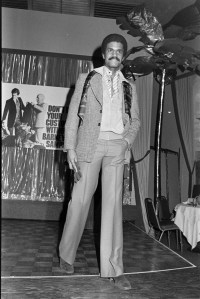 Model Renauld White on the runway at Barney Sampson Co. Fall 1977 Menswear Collection Fashion Show on March 27, 1977 in New York City.