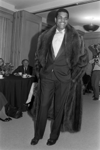 Model Renauld White in formal wear and fur from Jeffrey Banks fall 1985 menswear collection.
