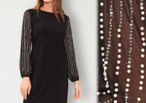Computerized precision placement for pearls and beads on sheer fabric.