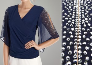 Laser-slit sleeves adorned with faceted silver beads- hot and highly affordable.