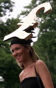A race goer arrives at Ascot Racecourse on Ladies Day before racing on the 3RD day of The Royal Meeting.