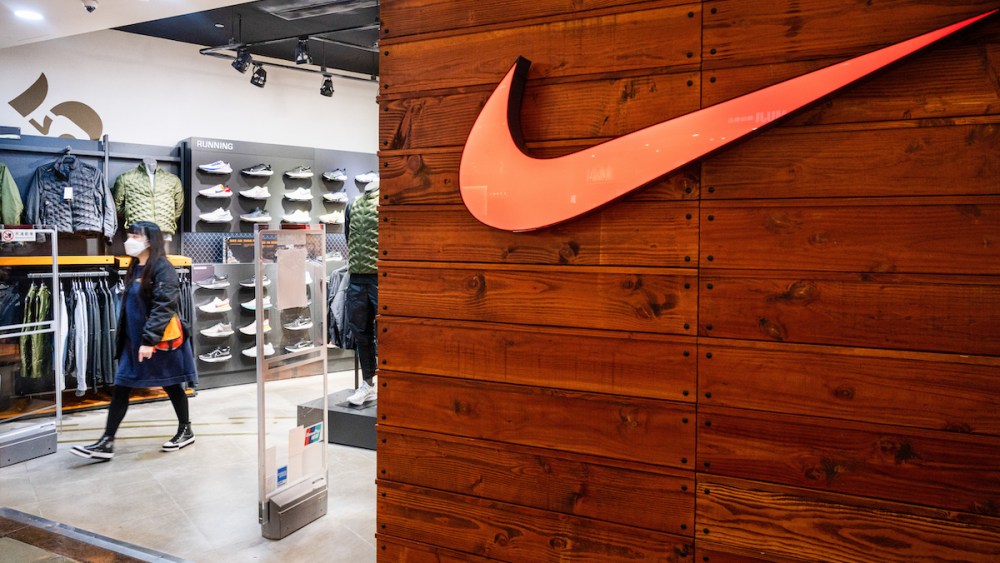 A shopper at a Nike store in Hong Kong.