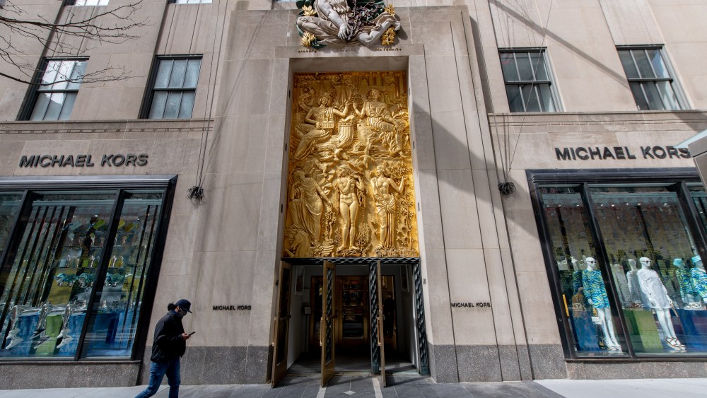 NEW YORK, NEW YORK - MARCH 25: A view of the door of the Michael Kors store at the Rockefeller Center on March 25, 2021 in New York City. (Photo by Roy Rochlin/Getty Images)