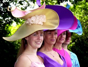 Women show off their stylish hats June 21, 2001 at Ascot Racecourse in Ascot, England. Today marks the third day of the Royal Ascot horse race event.