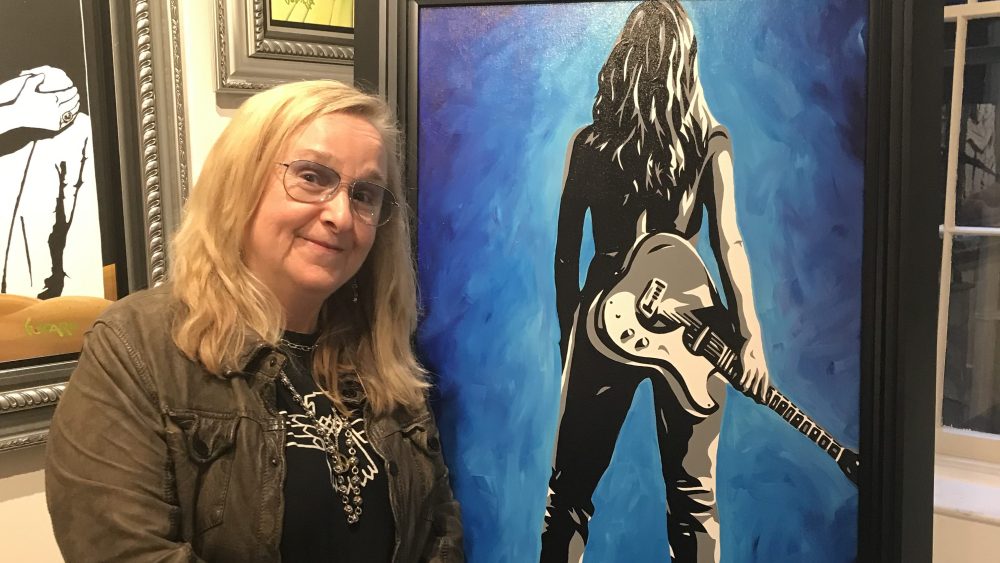 Melissa Etheridge and her portrait by Allison Lefcort, at the Park West Gallery
