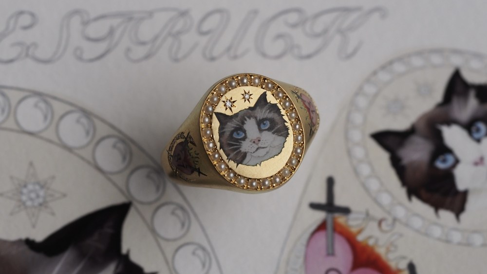 The Cece ring commissioned by Gigi Hadid for Taylor Swift, showcasing an image of Swift's cat Benjamin Button.