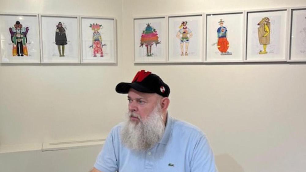 Walter Van Beirendonck at the book signing of "Draw the World Awake."
