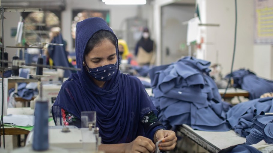 A garment worker works in a sewing section at the Surma Garments Limited in Savar, Bangladesh.